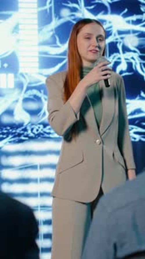 Woman Speaking at Corporate Event, Business Presentation