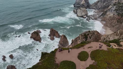 The Scenic Cliffs Overlooking the Turquoise Waves at Sintra Coast Portugal Invite Adventure