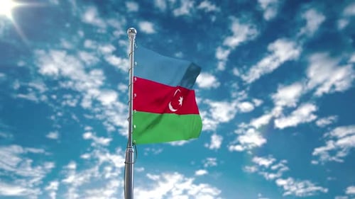 Azerbaijan Flag Waving Against Blue Sky