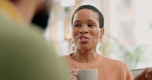 Woman Chatting and Holding Mug Indoors