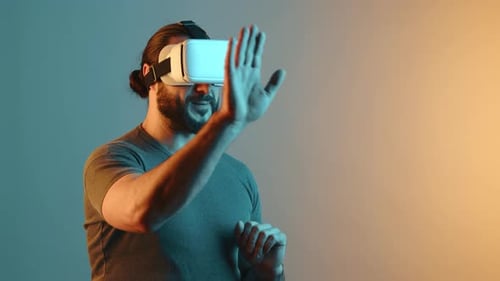 Man Engaging with Virtual Reality Exploring the Wonders of VR Technology