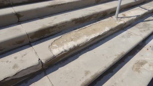 Weathered concrete staircase in city, motion view