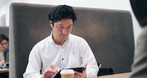 Japanese, business and man with tablet in office for finance report, planning budget and investment