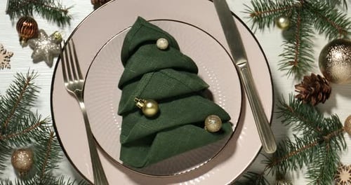 Christmas Table Setting with Napkin and Decorations