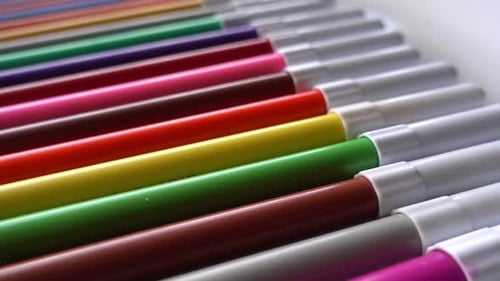 Colorful Markers Arranged Neatly in a Row