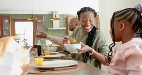 Family Meal Together at Home During Daytime