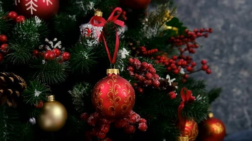 Christmas Tree Decorated with Red and Gold Ornaments