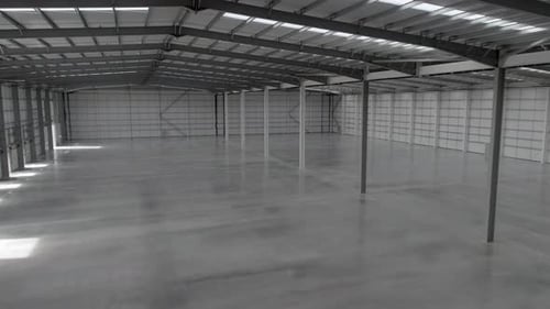 New Warehouse Interior View Showing an Empty Facility