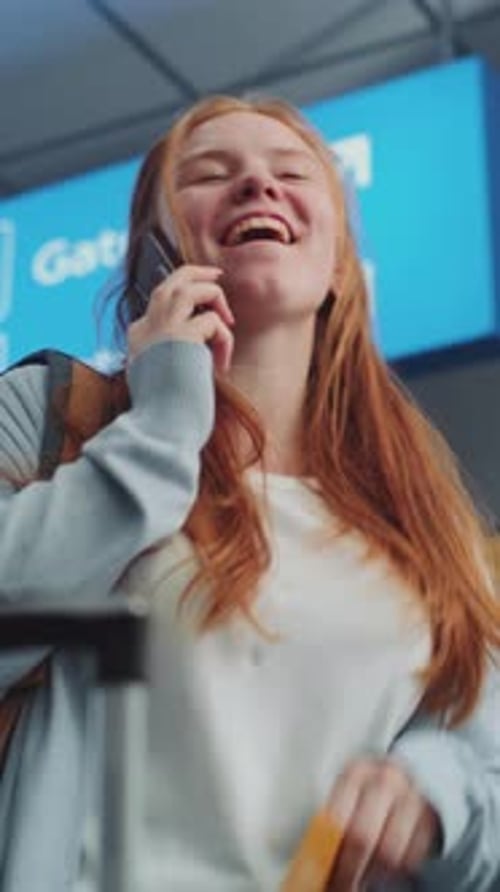 Crowded Airport Terminal Woman Holding Plane Ticket Talking By Mobile Phone