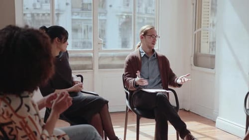 Group of People on Therapy Session in Community Mental Health Center