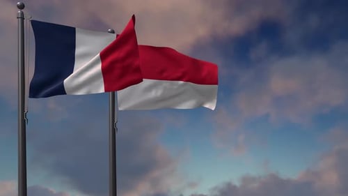 French and Indonesian Flags Waving Against Cloudy Sky