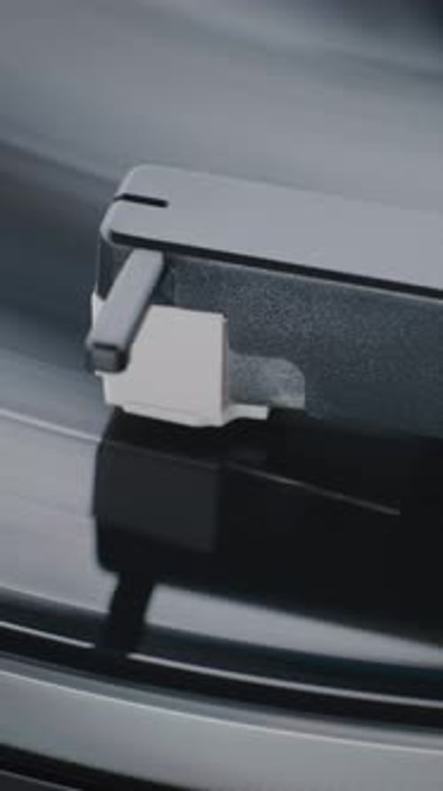 Rotating Vinyl Record on Record Player Close Up