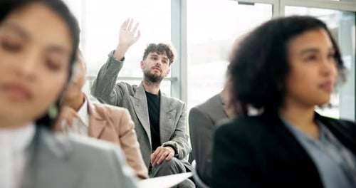 Adults Attend Business Conference, Man Asks Question