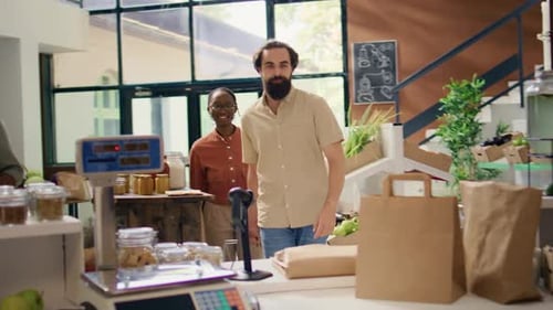 Shop Worker Weighing Goods For Happy Customers