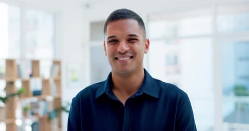 Face, designer and smile of business man in office, startup or company workplace