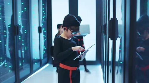 A Young Hacker Working in a Data Center with a Passion for Technology and Innovation