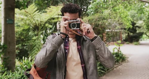 4k video footage of a young handsome man commuting in the city