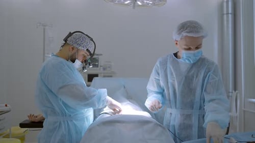 Medical Professionals Perform Surgery in Operating Room