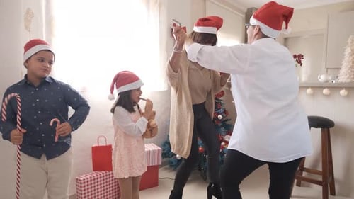 Happy Family Celebrates Christmas at Home