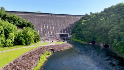 aerial push in to fontana dam and lake