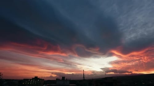Time Lapse of Colorful Sunrise Over City