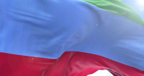 Realistic Fabric Flag Waving Against Blue Sky