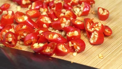 Close Up of Diced Red Chili Peppers on Board