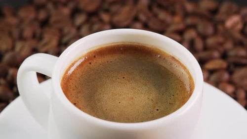 Fresh Espresso in a White Cup Close Up