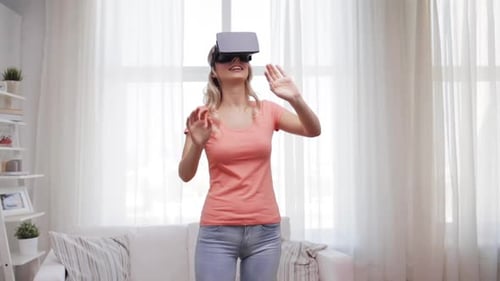 Woman Experiencing Virtual Reality Headset in Bright Living Room