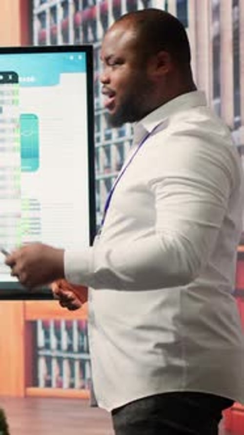 Professional Man Presents Business Data and Analytics