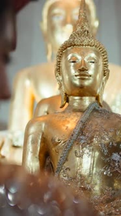 Golden Buddha Statue in a Thai Temple
