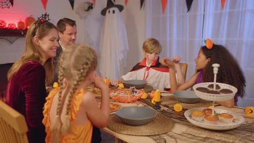 Family Celebrates Halloween at Home Together