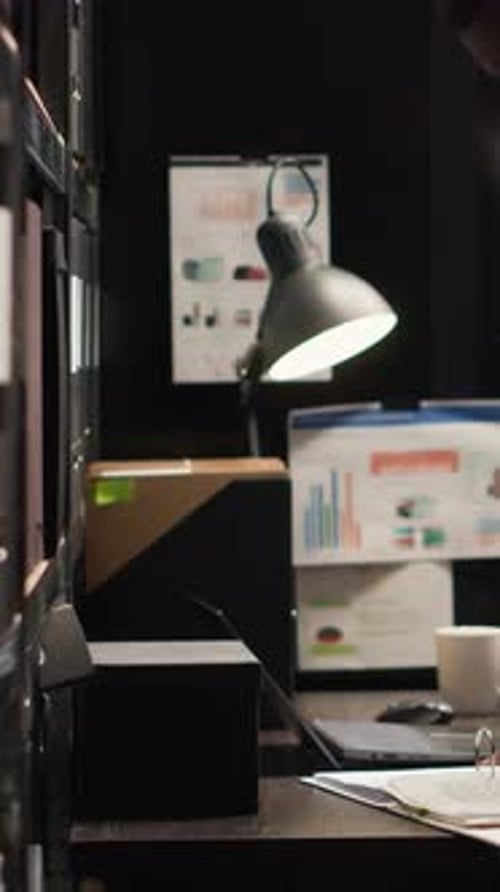 Vertical Video Detective Inspecting Evidence in Office