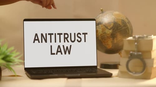 ANTITRUST LAW DISPLAYED IN LEGAL LAPTOP SCREEN