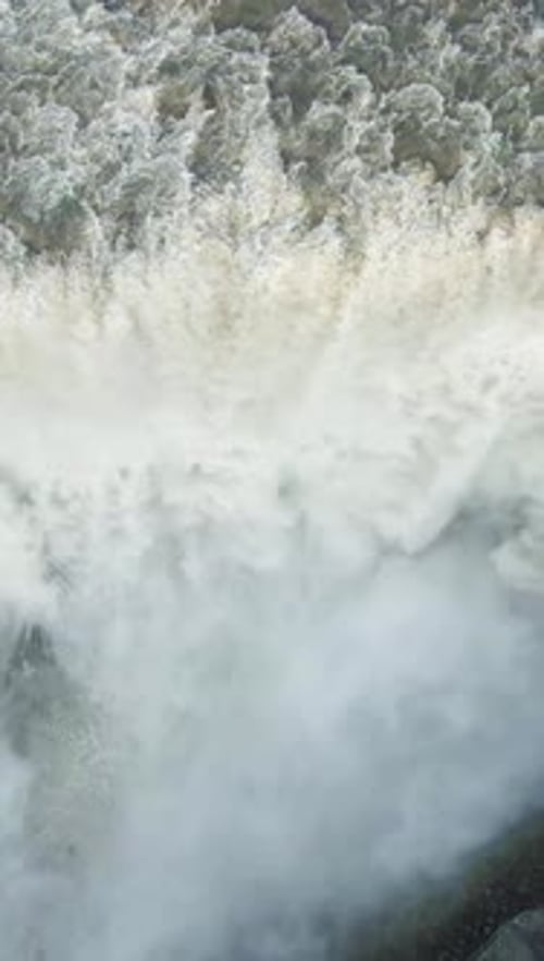 Dettifoss Powerful Waterfall Iceland Aerial TopDown View Vertical Video