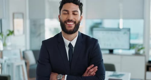 Smiling Man in Suit With Arms Crossed