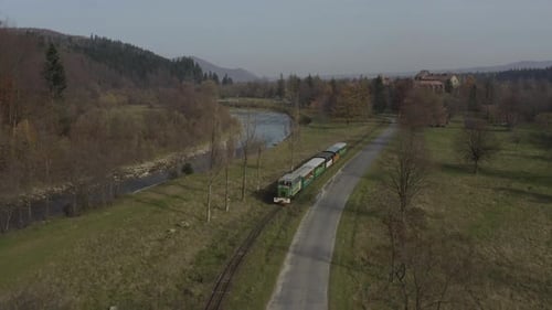 Aerial View of the Train Rides on the Railroad