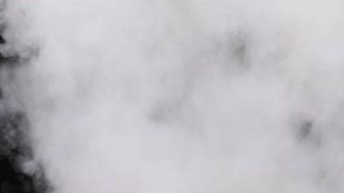 Realistic Smoke or Vapor Clouds Rise Up on Black Background