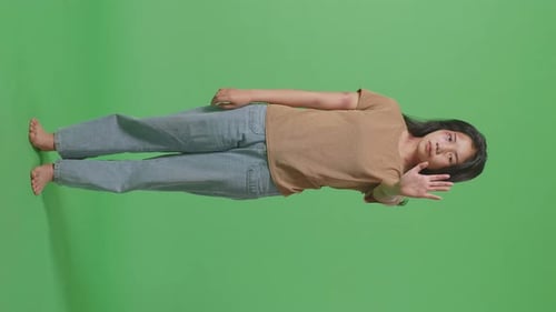Asian Woman With Bruise On Body Showing Hand Sign To Stop Violence In The Green Screen Background