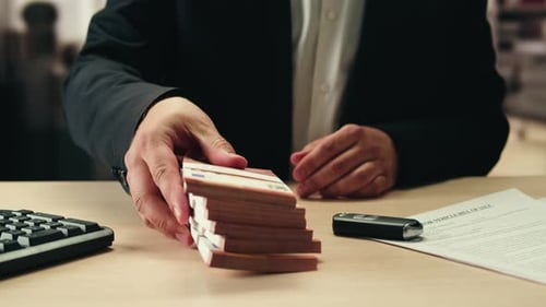 Stacks of Cash Dollars and Euro Banknotes Counting Buying Car Flat Home or Real Estate Counting