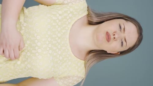 Young Woman Experiencing Pain and Discomfort