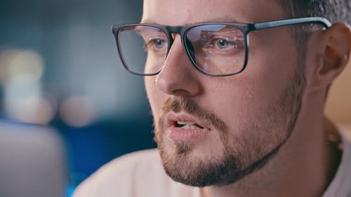 Businessman Analyzing Stock Market Eyeglasses Reflection of Trading Platform Thoughtful Investor Guy