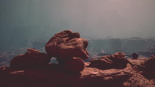 Large Rock Resting on Rocky Hillside