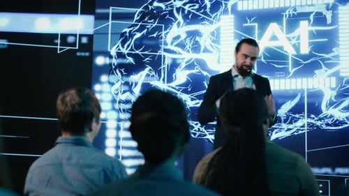 Man with beard discusses AI with audience