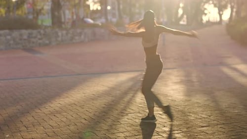 Modern dance, creative and woman contemporary dancing in the city training her movement for a high