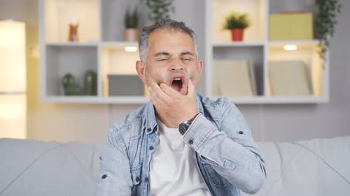 Man with toothache.