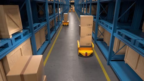 Autonomous mobile robots transporting cardboard boxes in a warehouse