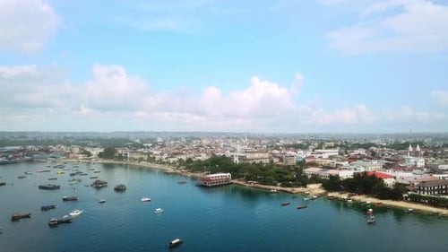 4k video footage of a city along the coastline