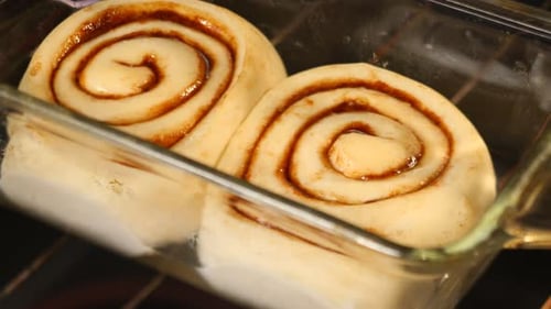 Cinnamon Rolls Baking, Rising in Oven, Food Preparation