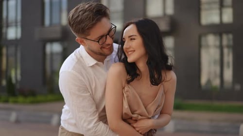Affectionate Couple Embracing in the City